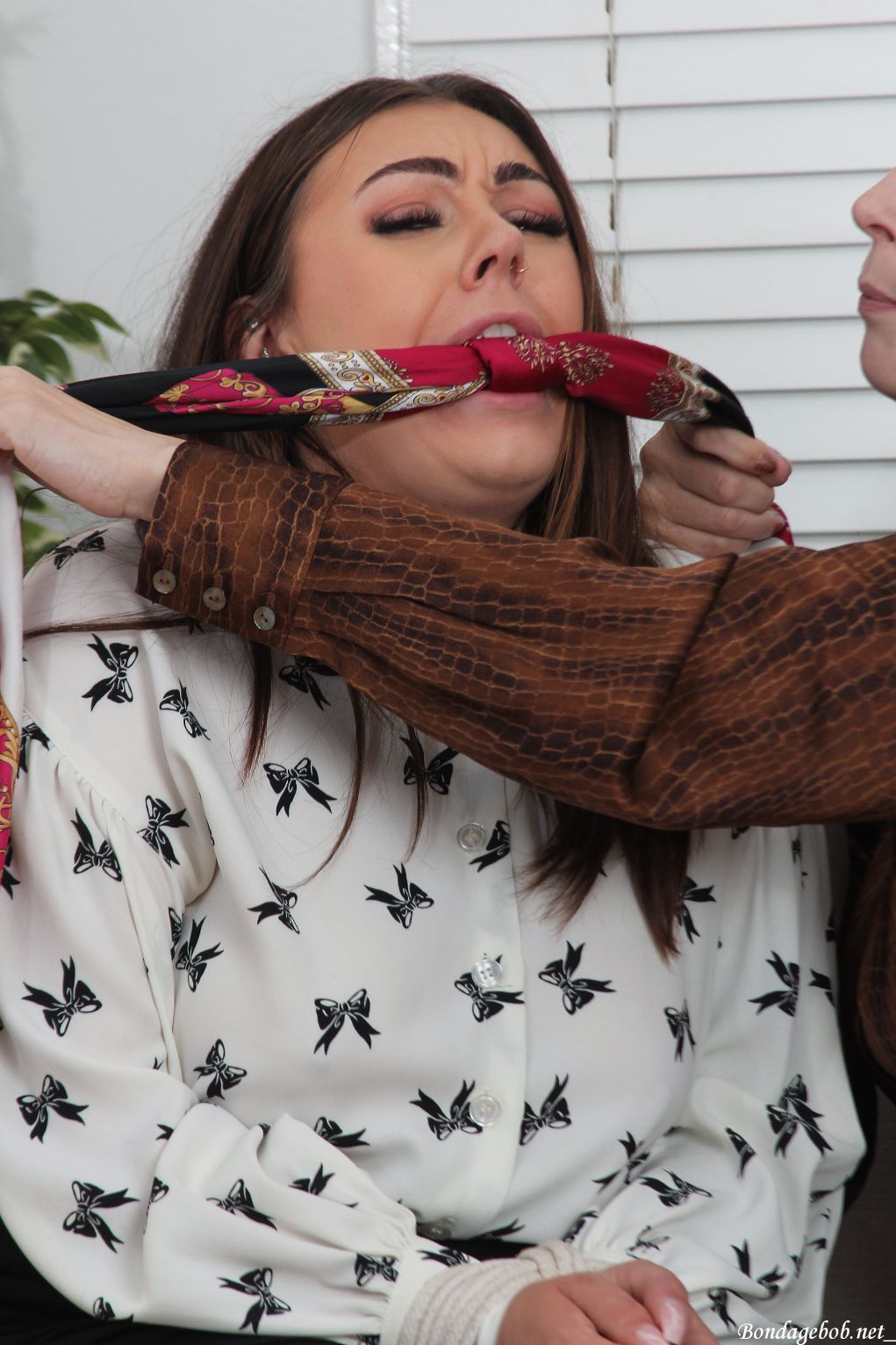 Kacie James & Temptress Kate in bondage.