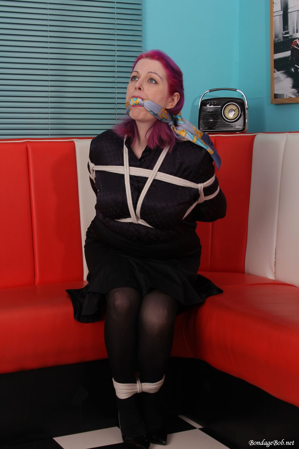 Temptress Kate in bondage.