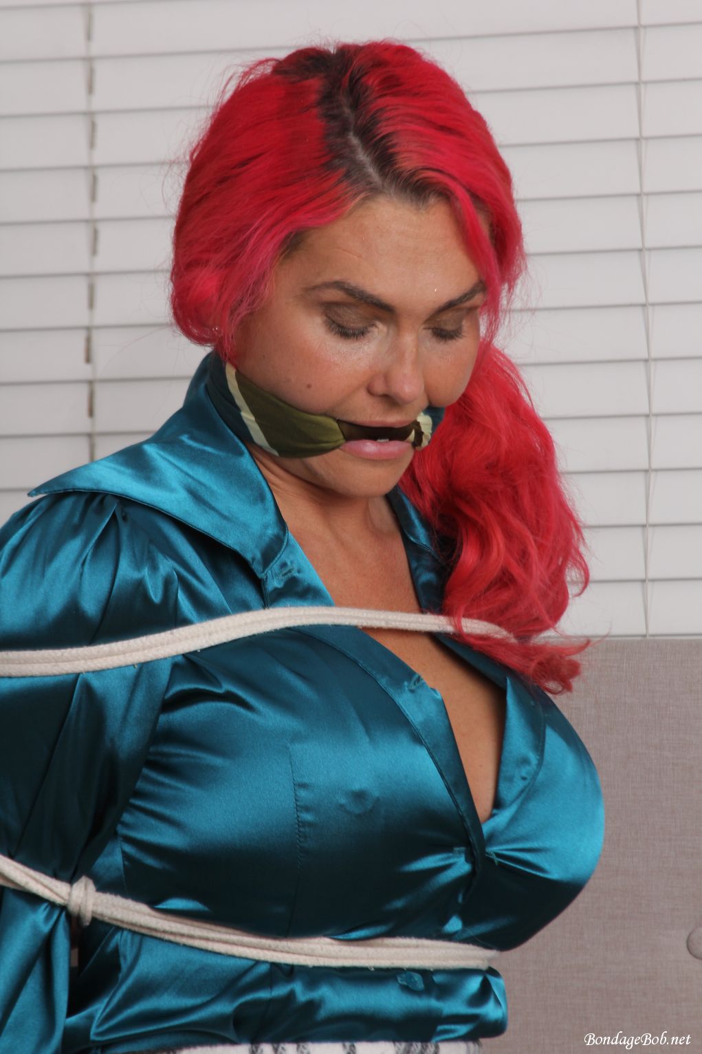 Roxi Keogh in bondage.